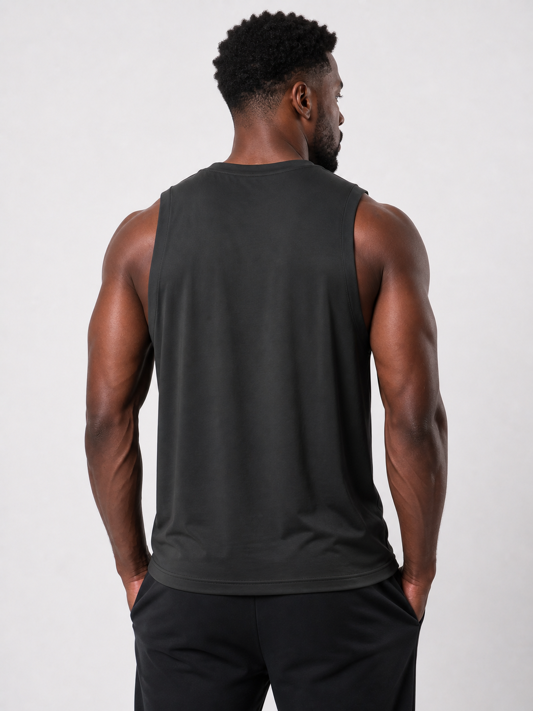 TWENTY Fitness Performance Vest in midnight black, lightweight athletic vest with a sleek, fitted design for active wear.