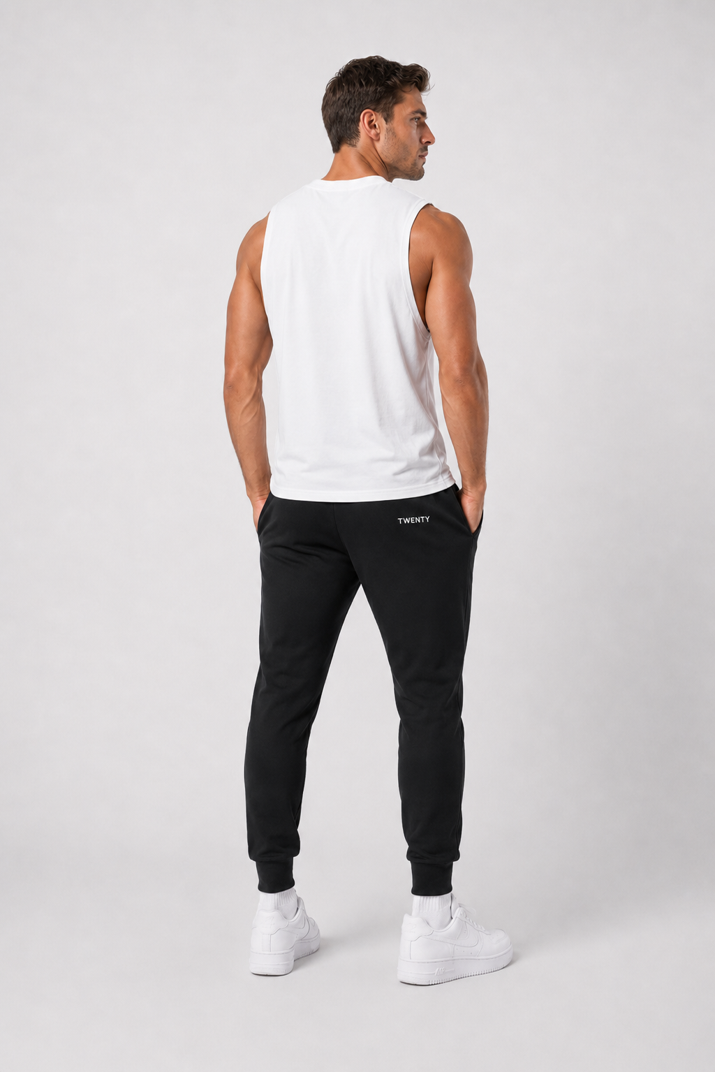 TWENTY Performance Vest in Arctic White by TWENTY Fitness, lightweight athletic vest with sleek design and breathable fabric.