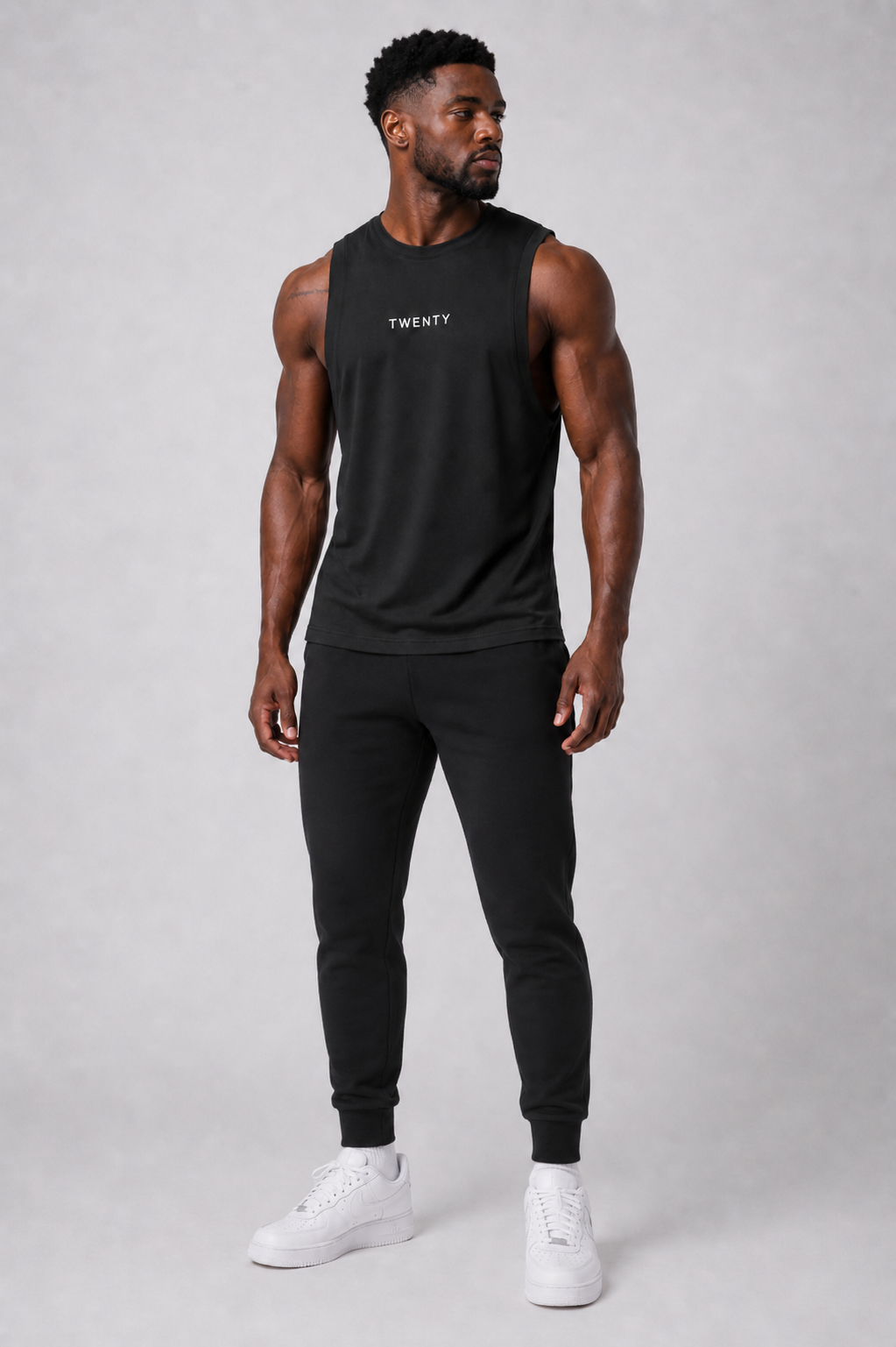 TWENTY Performance Vest in midnight black, lightweight athletic vest with breathable fabric for fitness workouts.