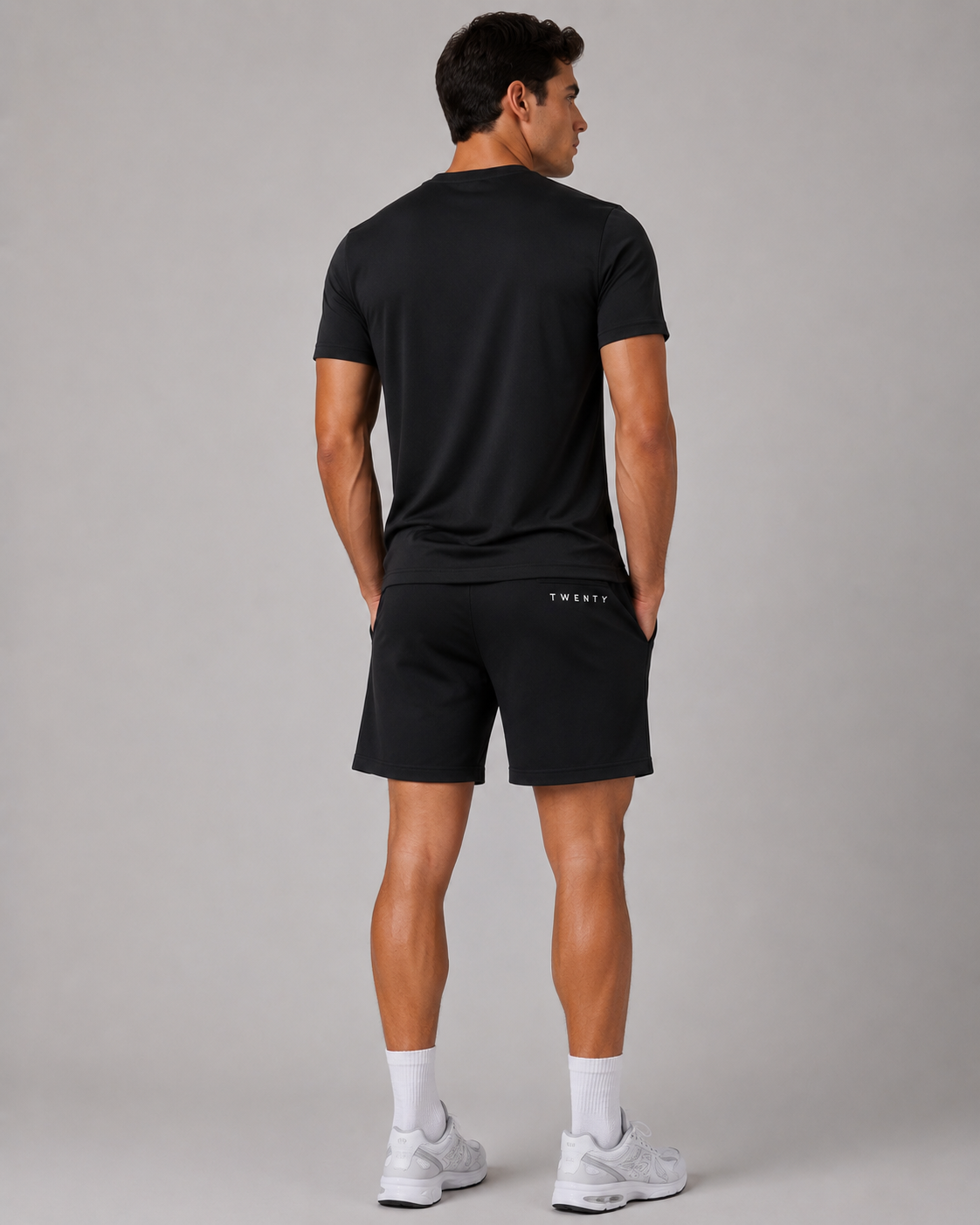 TWENTY Fitness TWENTY Performance Set in black, featuring athletic leggings and sports bra for active wear.